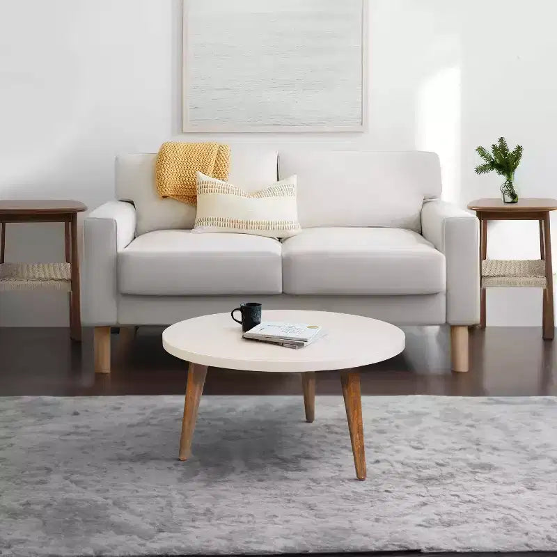 24" Round Coffee Table with Off-White Top and Tapered Wood Legs